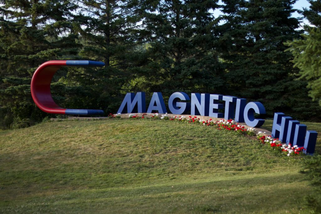 Panoramic view of Magnetic Hill, a fascinating tourist attraction in Moncton, New Brunswick.